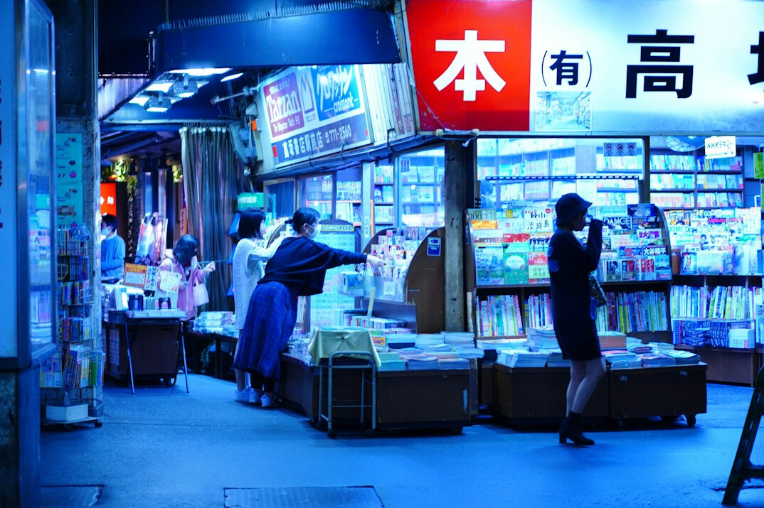 person reading book at night